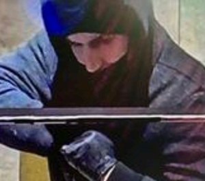 This photo provided by the Las Vegas Metropolitan Police Department shows a suspect captured by security cameras on Jan. 6, 2022, during a robbery at the Aliante hotel-casino in North Las Vegas.