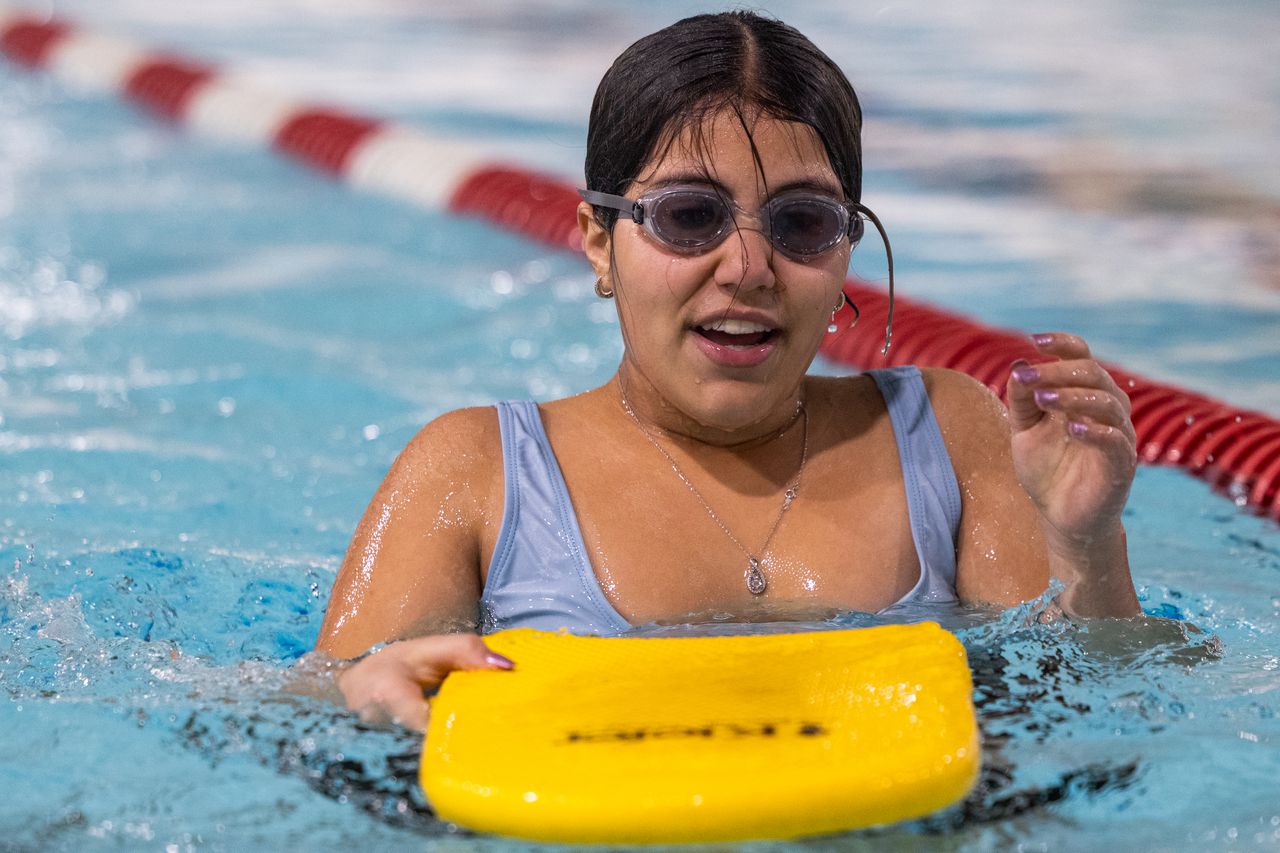 Inner-City Dive Team children practice swimming