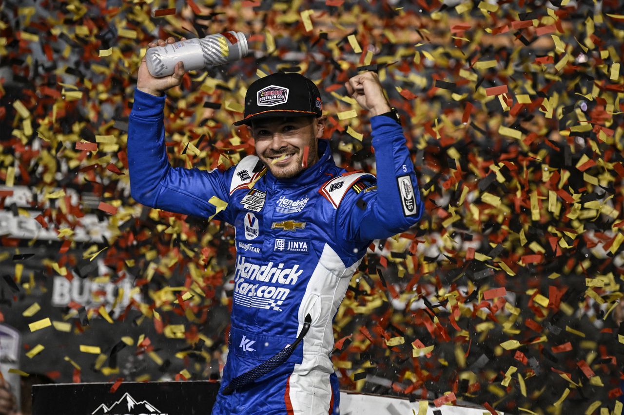 Kyle Larson celebrates NASCAR win