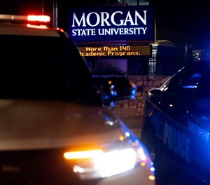 Police block off the entrance to Morgan State University as they respond to a shooting, Oct. 3, 2023, in Baltimore.