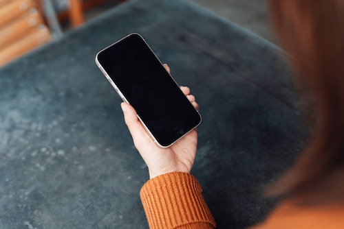 Woman holding smartphone