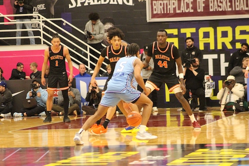 Wasatch Academy's Katrelle Harmon guards Arkansas commit Darius Acuff.