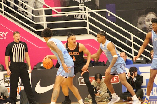 Isiah Harwell handles the ball for Wasatch Academy against IMG Academy.