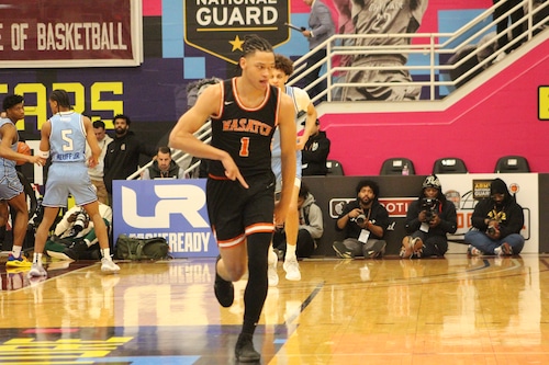 Isiah Harwell celebrates hitting a three for Wasatch Academy boys basketball against IMG Academy.