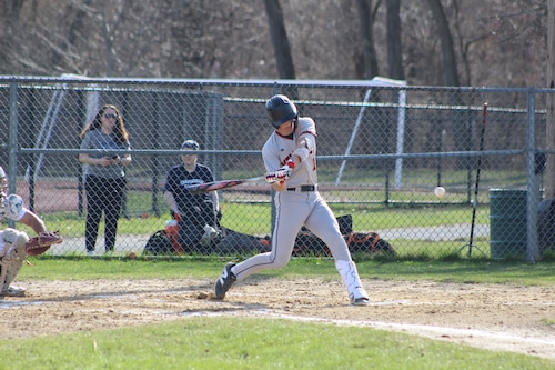 Sophomore Max Boehm takes a swing for Wellesley baseball in a game against Framingham.