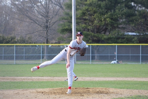 Sophomore Jack O'Grady pitching for Wellesley baseball.