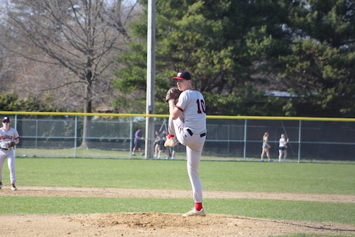 Sophomore Jack O'Grady pitching for Wellesley baseball.