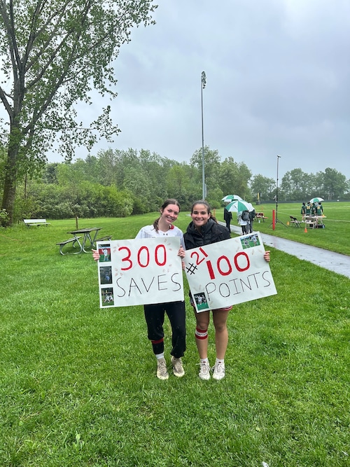 Despite the outcome, the Mount Greylock girls' lacrosse team celebrated goalie Teigan Brady (left) making her 300th career save and Molly Cangelosi (right) earning her 100th career point against Burr & Burton on 05/18/25.