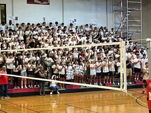 Milford Volleyball protests the detainment of teammate Marcelo Gomes