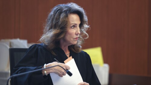 Public Defenders Pay Dispute