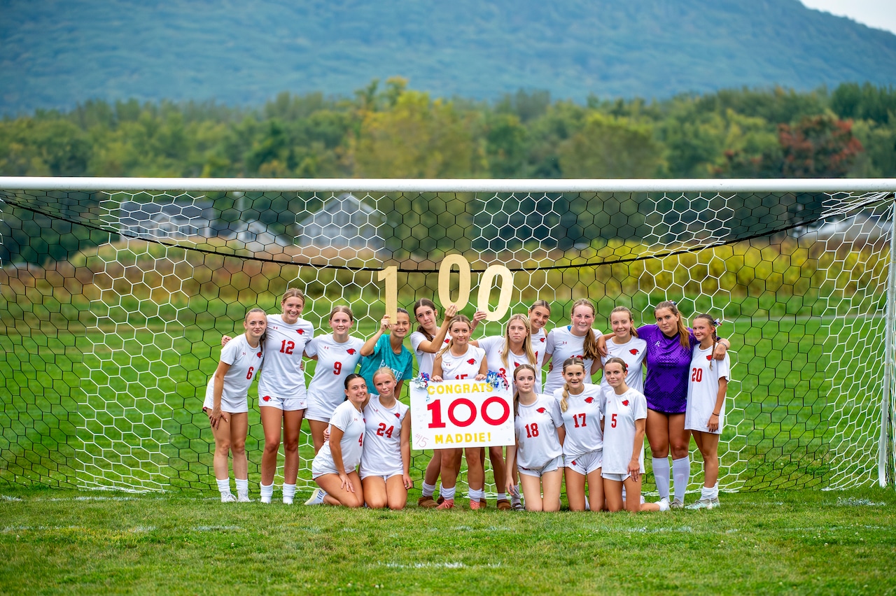 The Frontier girls' soccer team celebrated Madelyn Fagan recording her 100th career point against Hopkins Academy on 09/23/25.